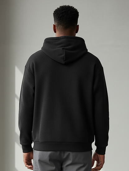 Unisex Corded Pullover Hoodie in Black – model back