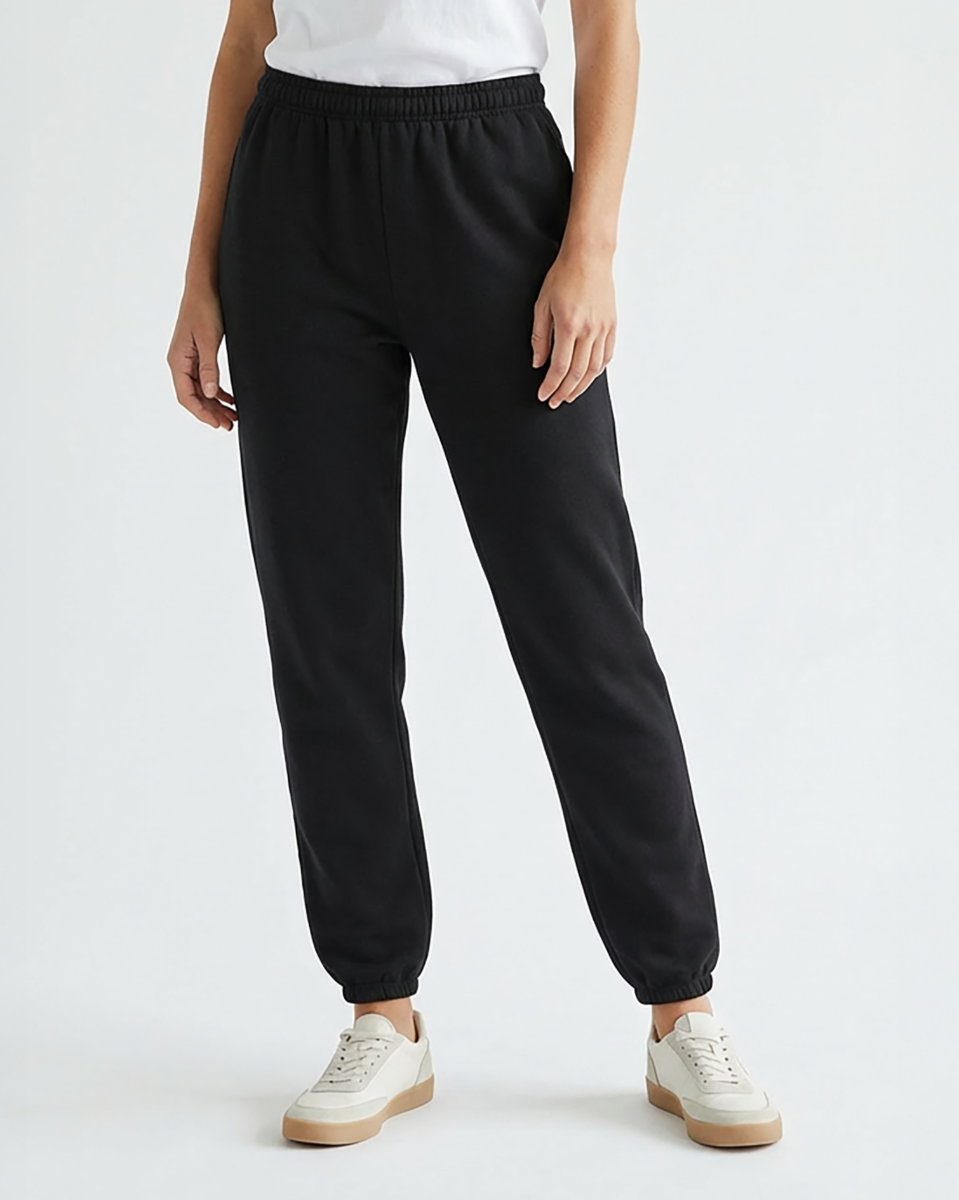 Unisex Core Fleece Pant in Black – model front 2