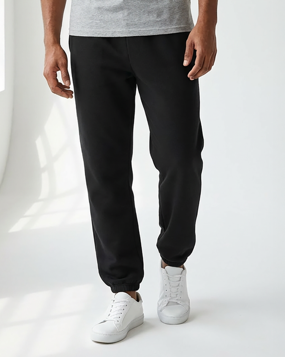 Unisex Core Fleece Pant in Black – model front
