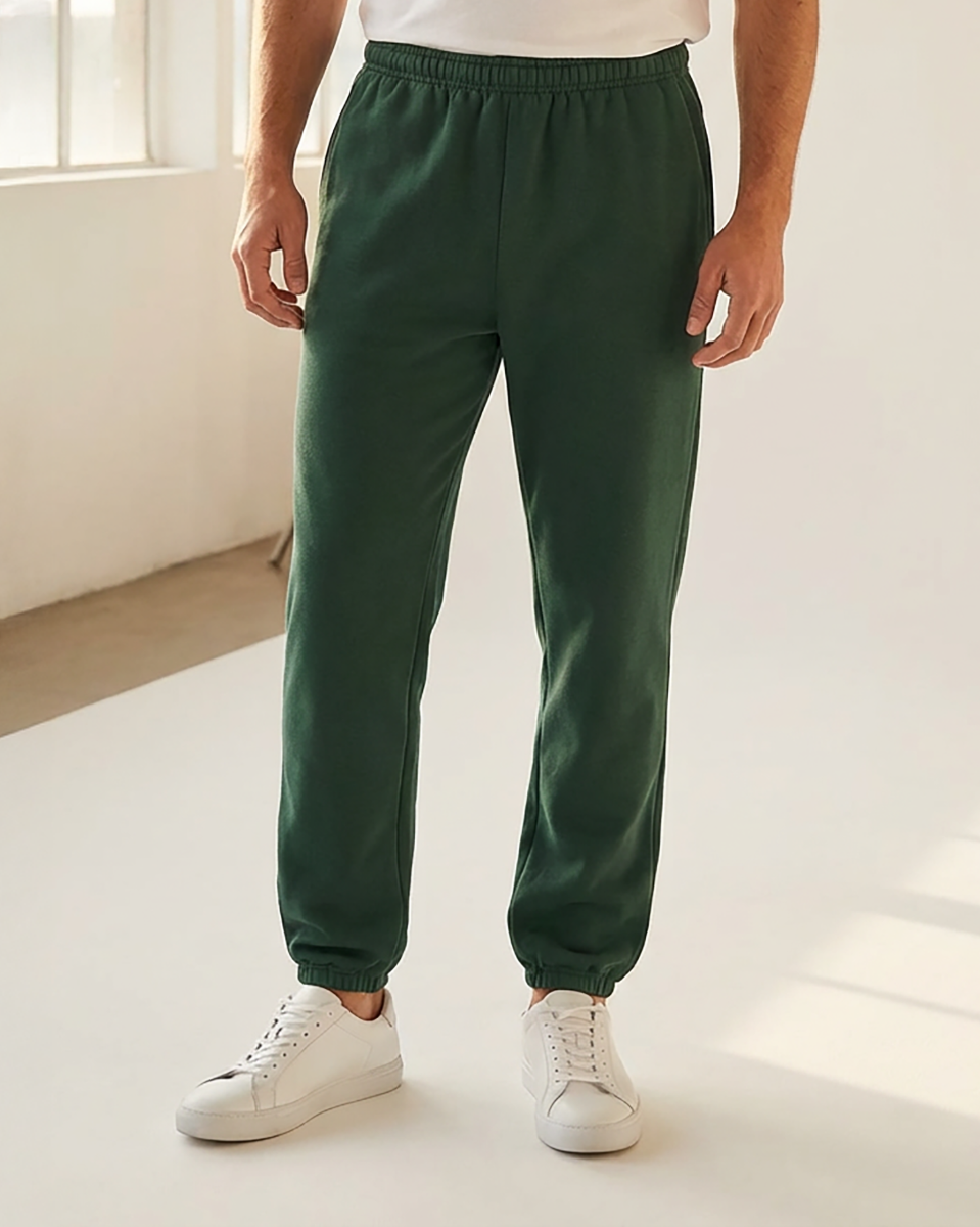 Unisex Core Fleece Pant in Dark Green – model front