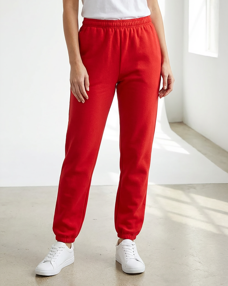 Unisex Core Fleece Pant in True Red – model front
