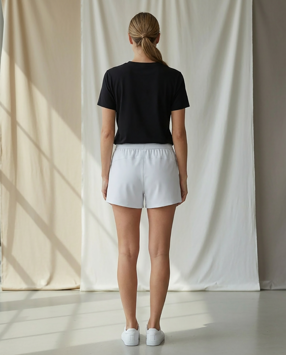 Women's Essential Spirit Short in White – model back