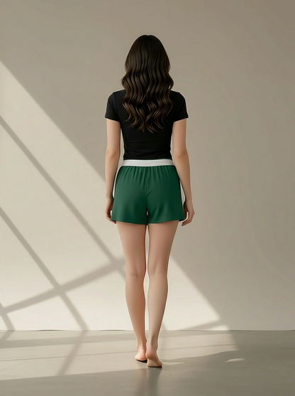 Women's Essential Spirit Short in Dark Green – model back