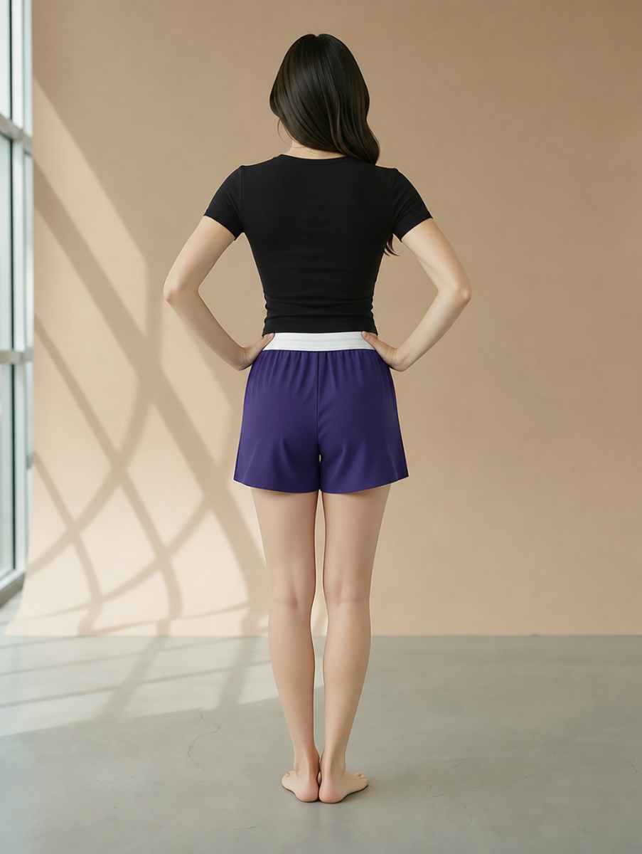Women's Essential Spirit Short in Purple – model back