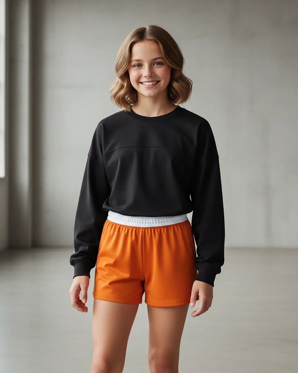 Boxercraft BY6504 Girls Essential Spirit Shorts - Orange - Model Front | Orange