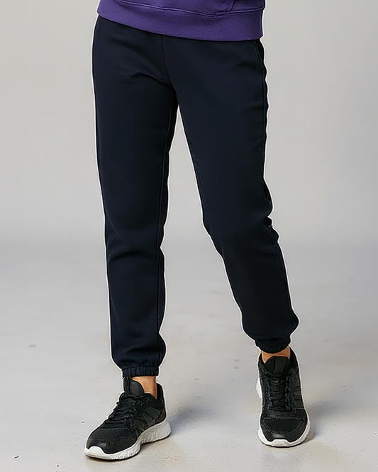 Kids' Core Fleece Pant in Black – model front