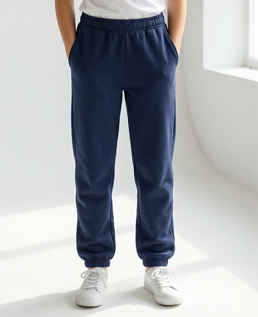 Kids' Core Fleece Pant in Navy – model front