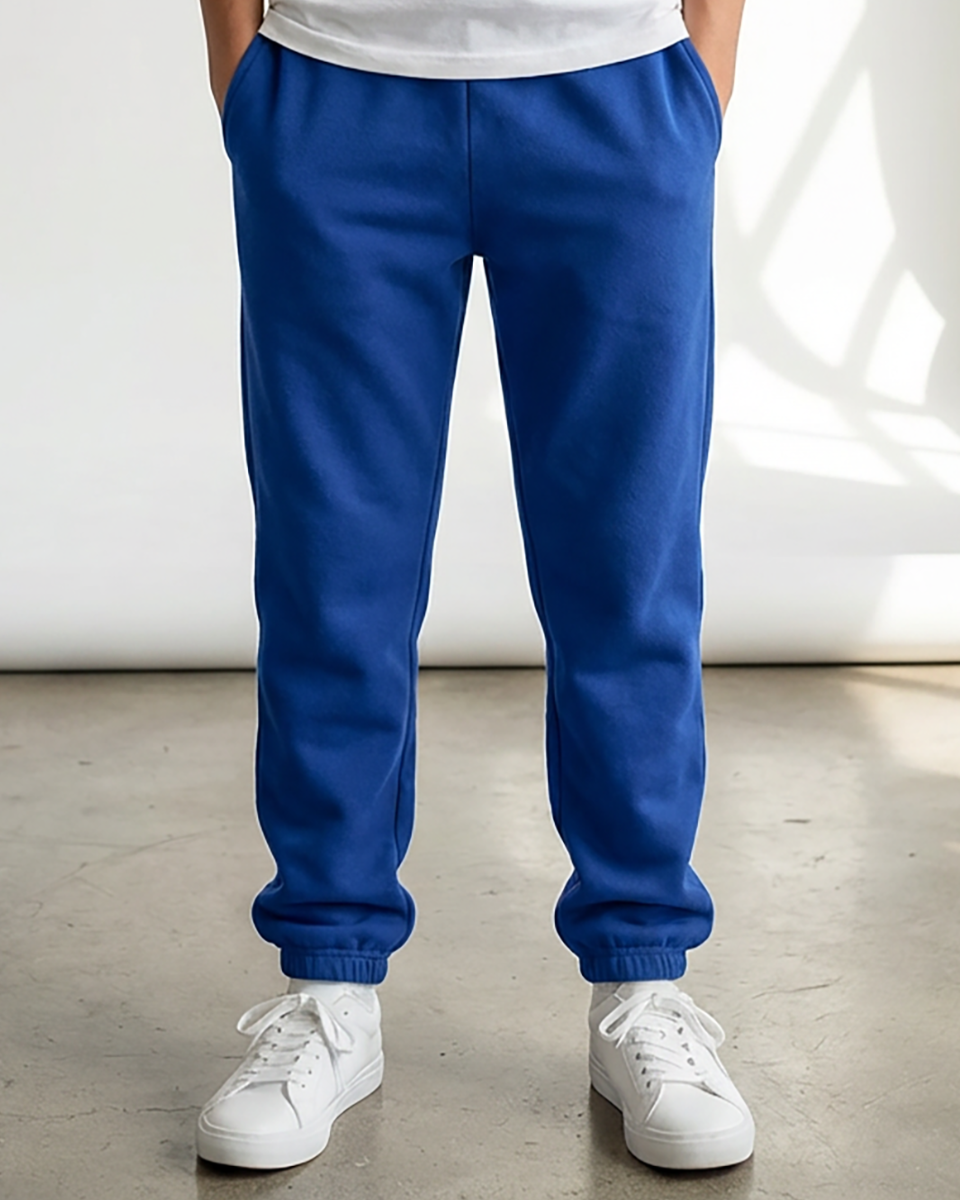 Kids' Core Fleece Pant in Electric Royal – model front