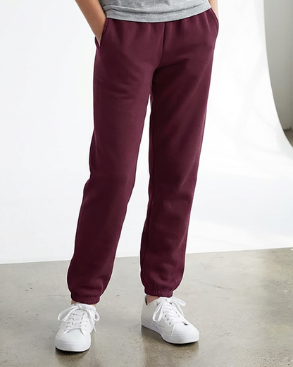 Kids' Core Fleece Pant in Maroon – model front